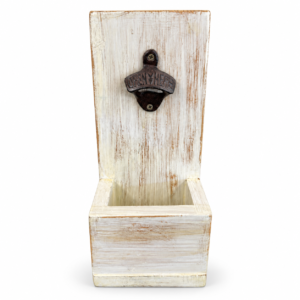 Distressed white wooden wall-mounted bottle opener with vintage metal opener and built-in bottle cap catcher
