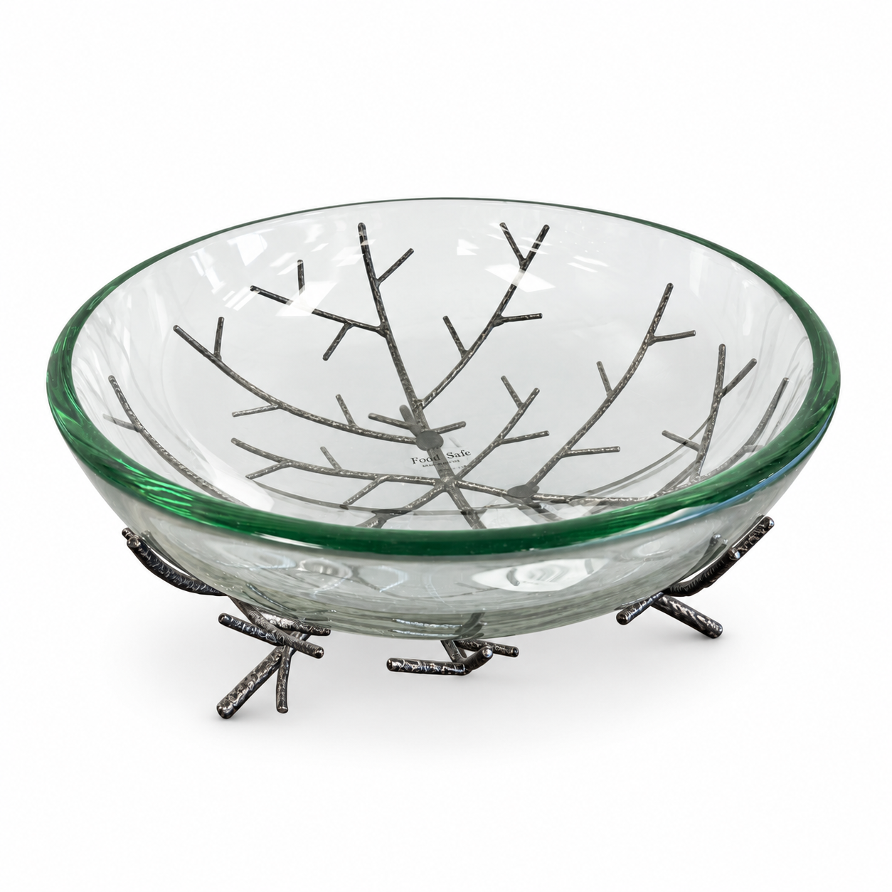 Clear glass decorative bowl resting on a dark metal branch-inspired stand.
