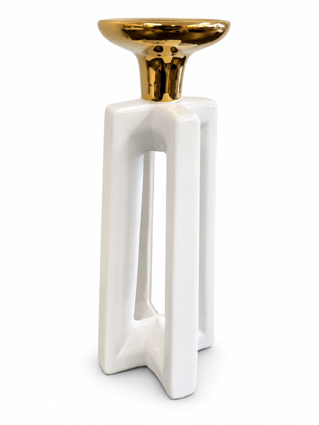Modern white ceramic candle holder with an open geometric base and polished gold top.