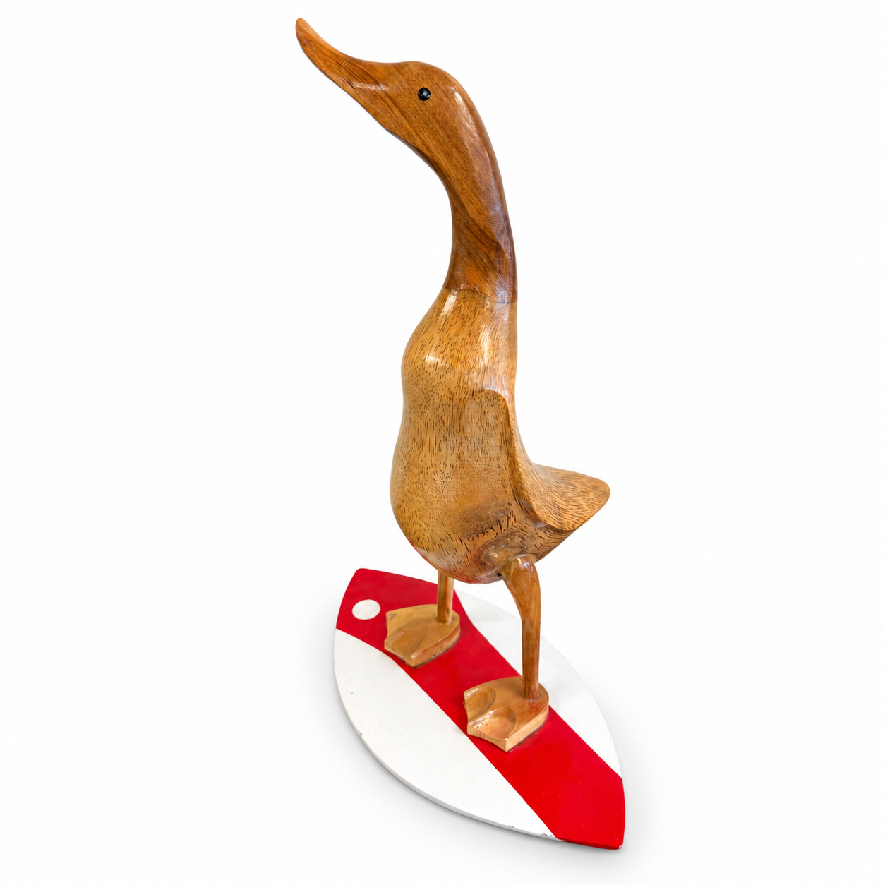 Handcrafted wooden duck sculpture standing on a red and white surfboard-style base.