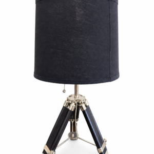 Black tripod table lamp with polished metal accents and a coordinating black drum shade.