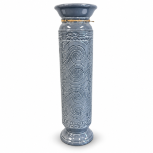 Tall blue-gray decorative vase with an embossed swirling pattern, glossy finish, and rustic rope accent.