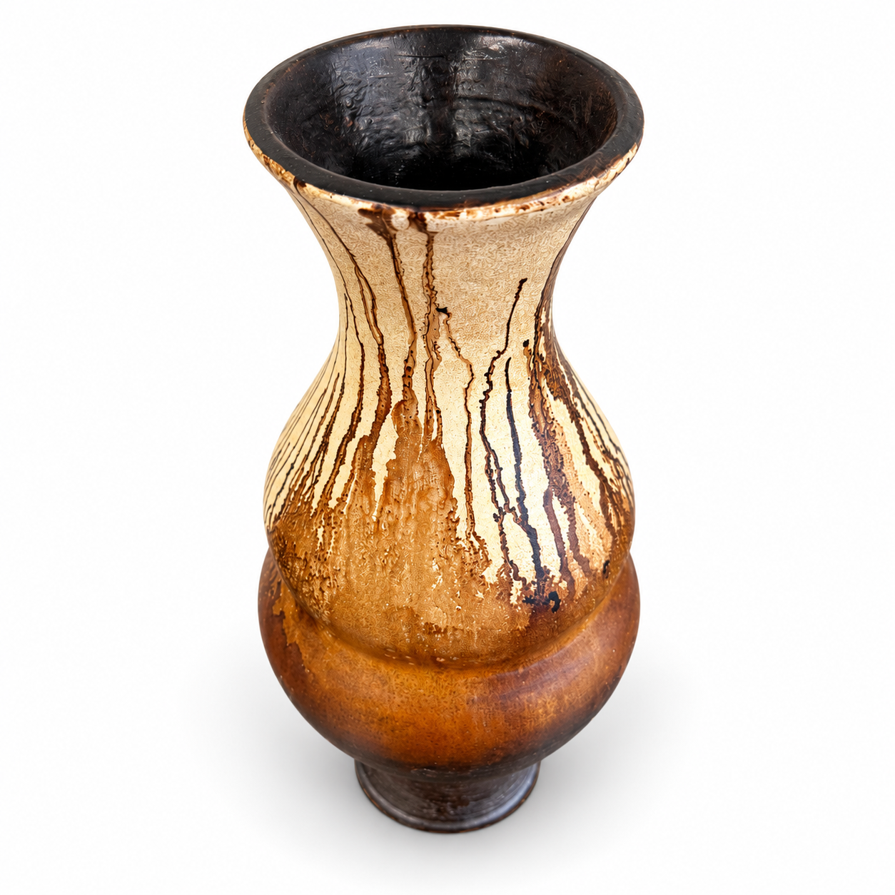 Tall amber and black decorative vase with a curved silhouette and artistic dark drip detailing.