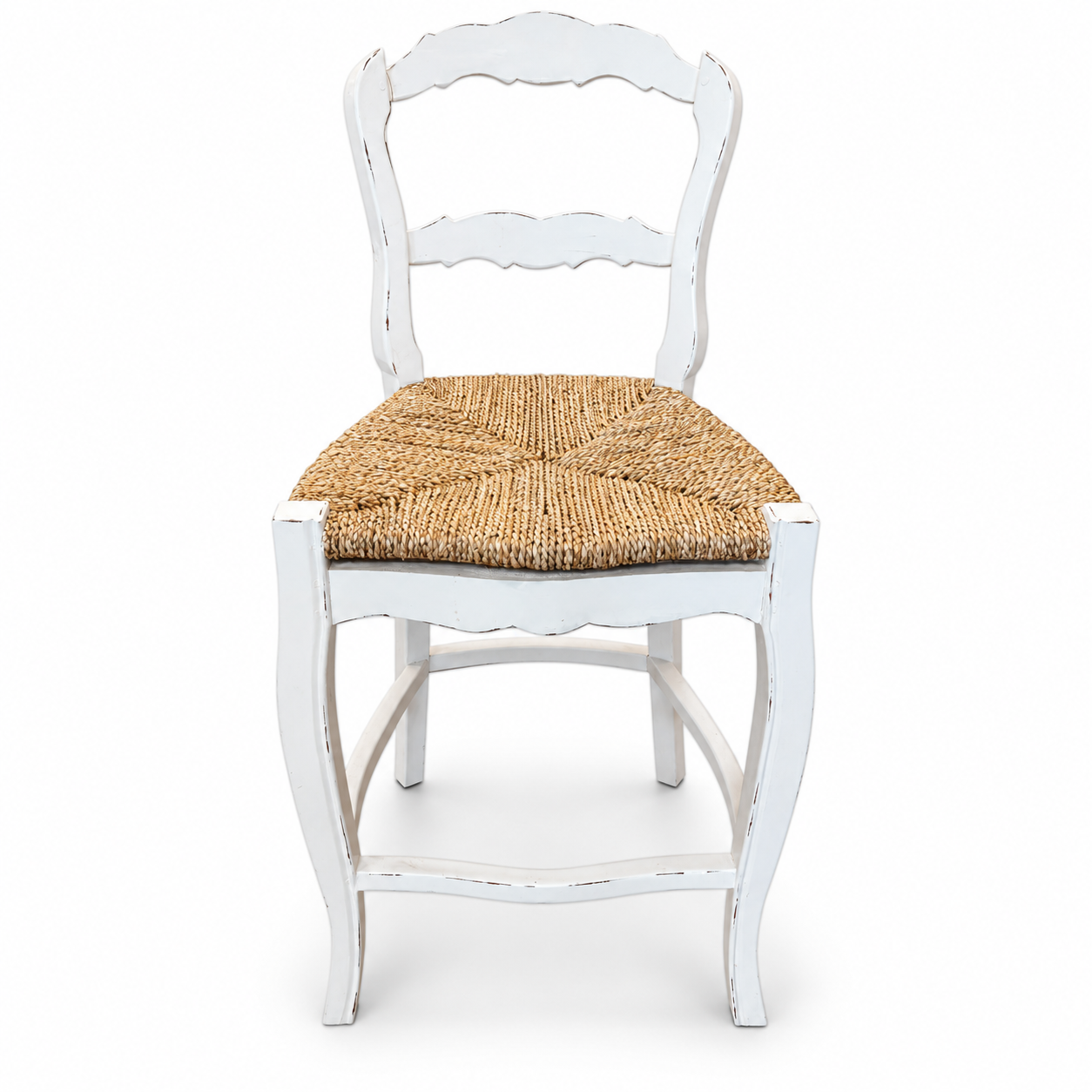 Distressed white French country wooden chair with curved ladder back and natural woven rush seat