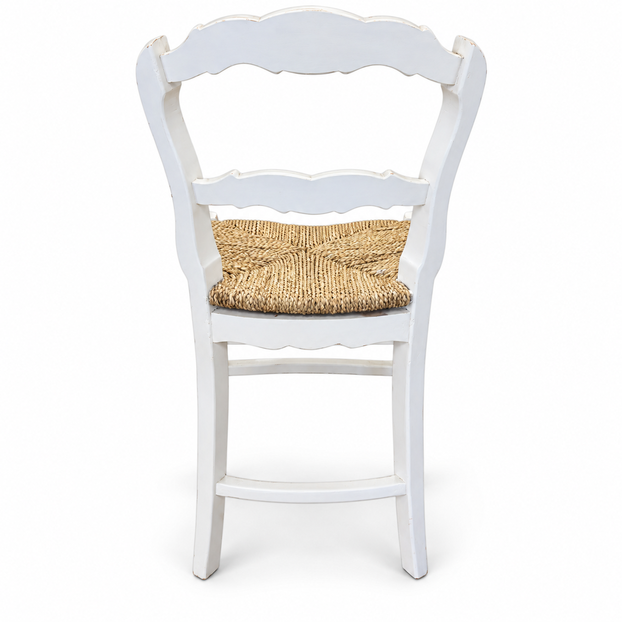 Distressed white French country wooden chair with curved ladder back and natural woven rush seat