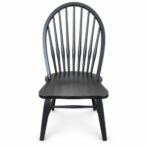 Black wooden Windsor dining chair with tall arched spindle back and contoured solid wood seat