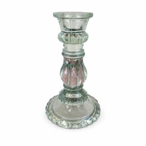 Clear glass pedestal candle holder with an ornate sculpted stem and decorative round base.