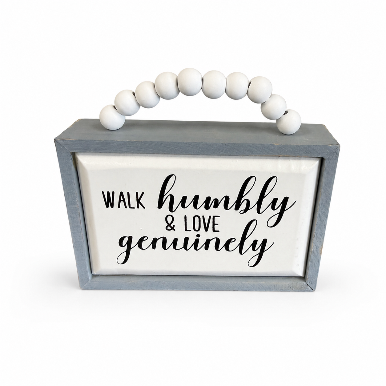 Farmhouse wood sign with gray frame, white beaded handle, and “Walk Humbly & Love Genuinely” inspirational message.