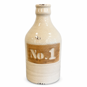 Cream ceramic bottle vase with crackle glaze, distressed details, and raised No. 1 decorative label.