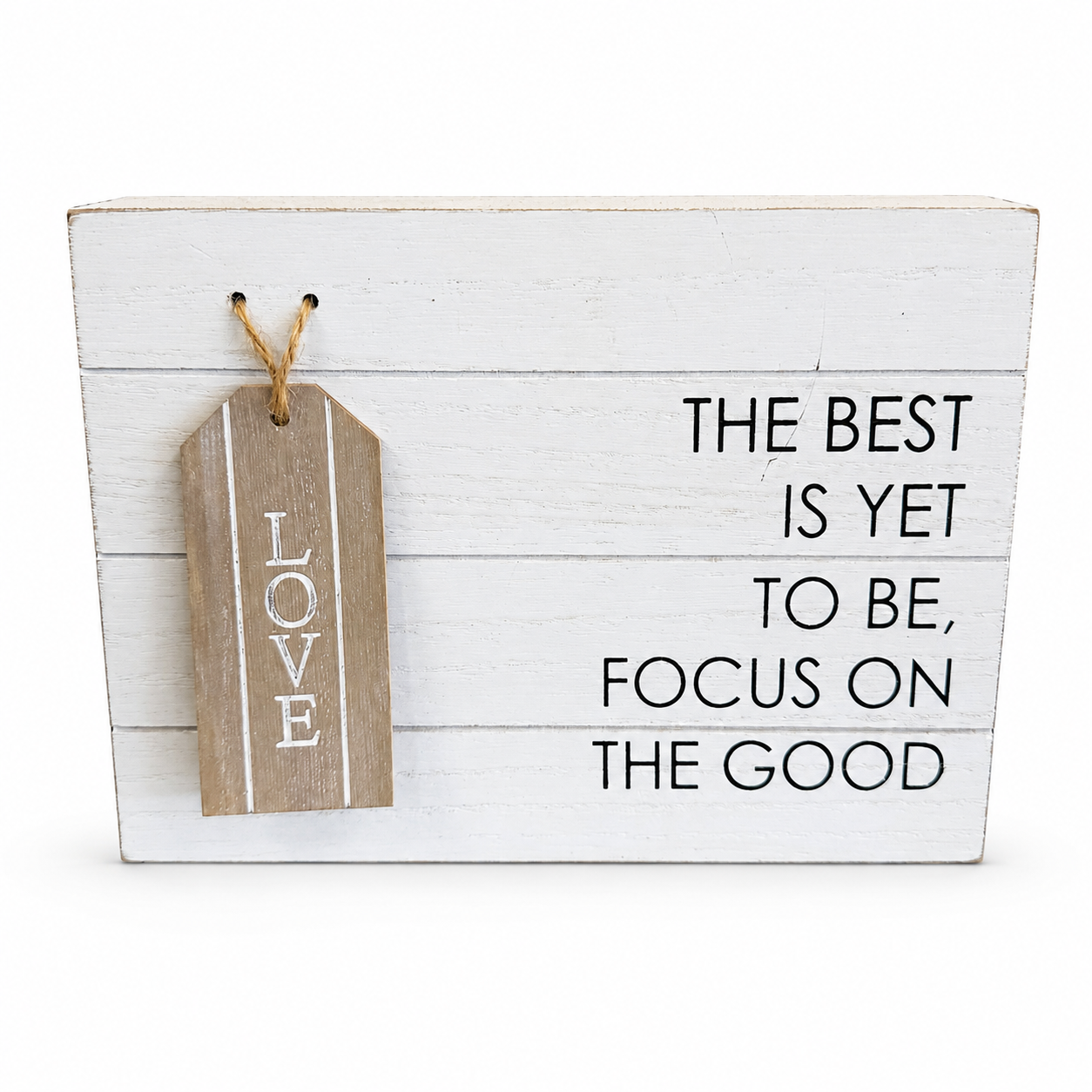 White rustic wood sign reading “The Best Is Yet to Be, Focus on the Good” with a hanging wooden Love tag.